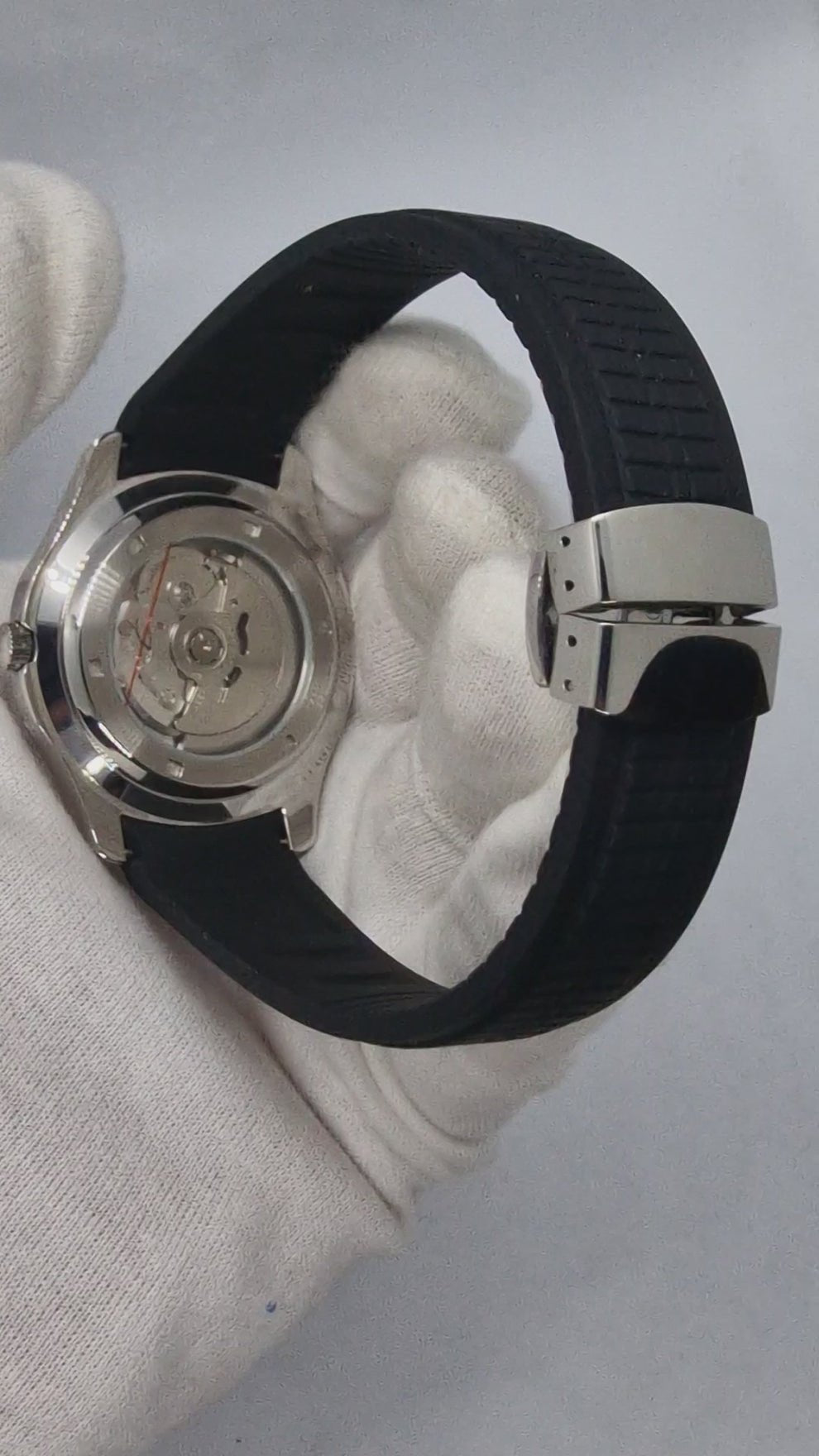 black nautiko seiko mod on wrist rubber strap