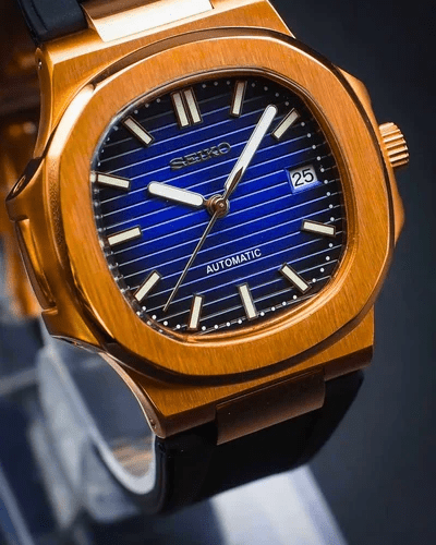 rose gold black seiko mod nautiko black textured dial close up