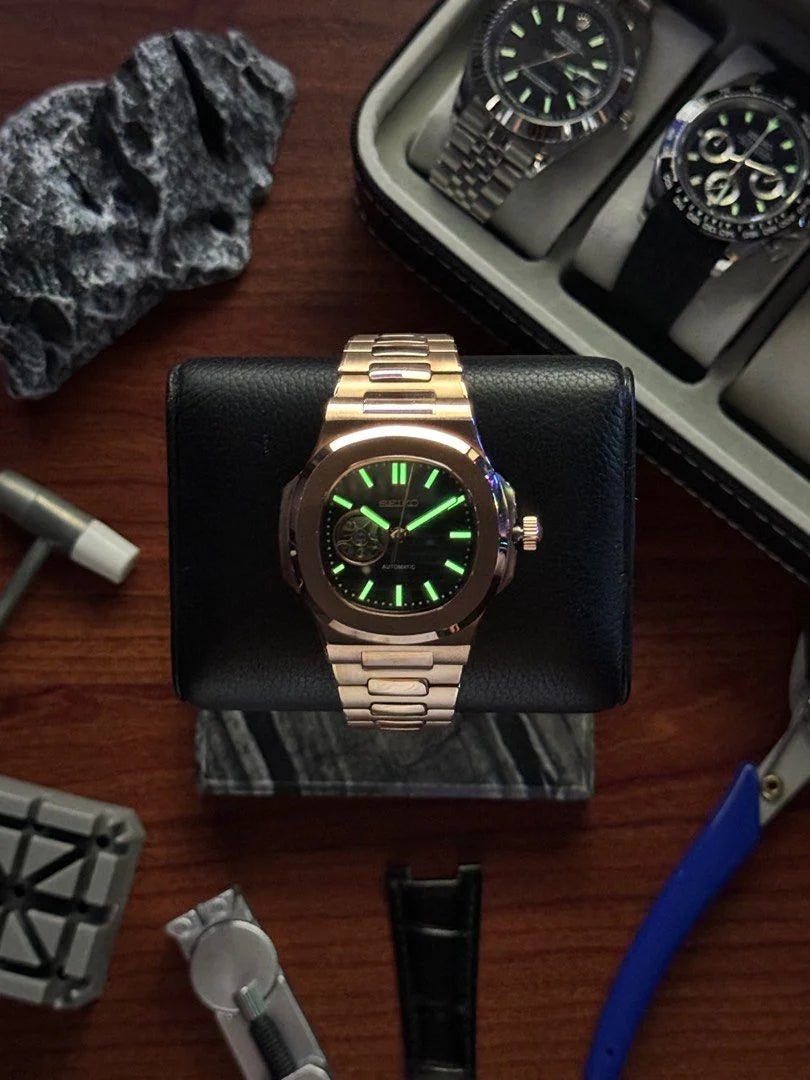 Seiko Mod Nautiko Open Heart Rose Gold Black integrated bracelet watch
lume