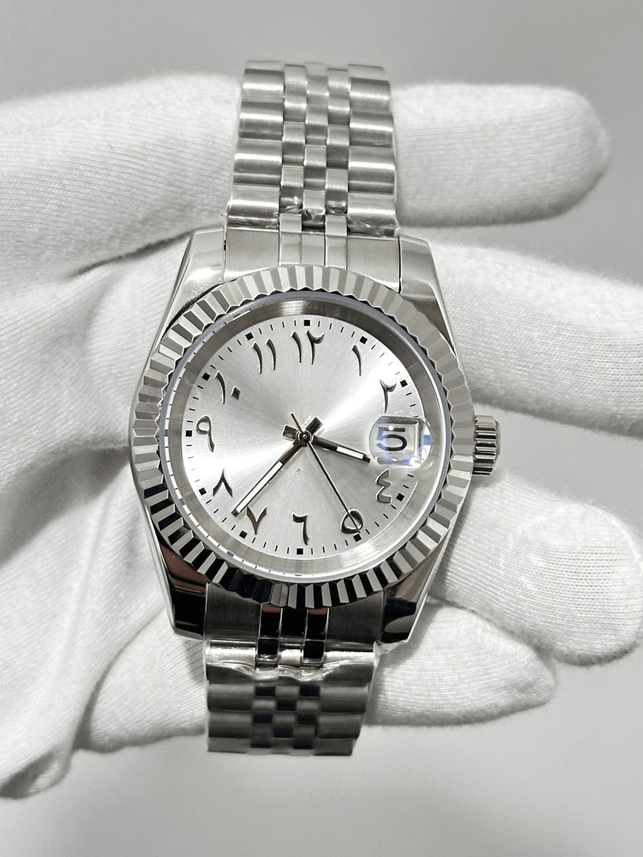 silver Arabic Seiko mod automatic watch with stainless steel bracelet, product shot
