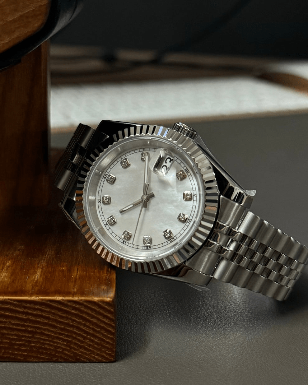 white diamond dial stainless steel Seiko NH35 mod watch on jubilee bracelet, front view no logo