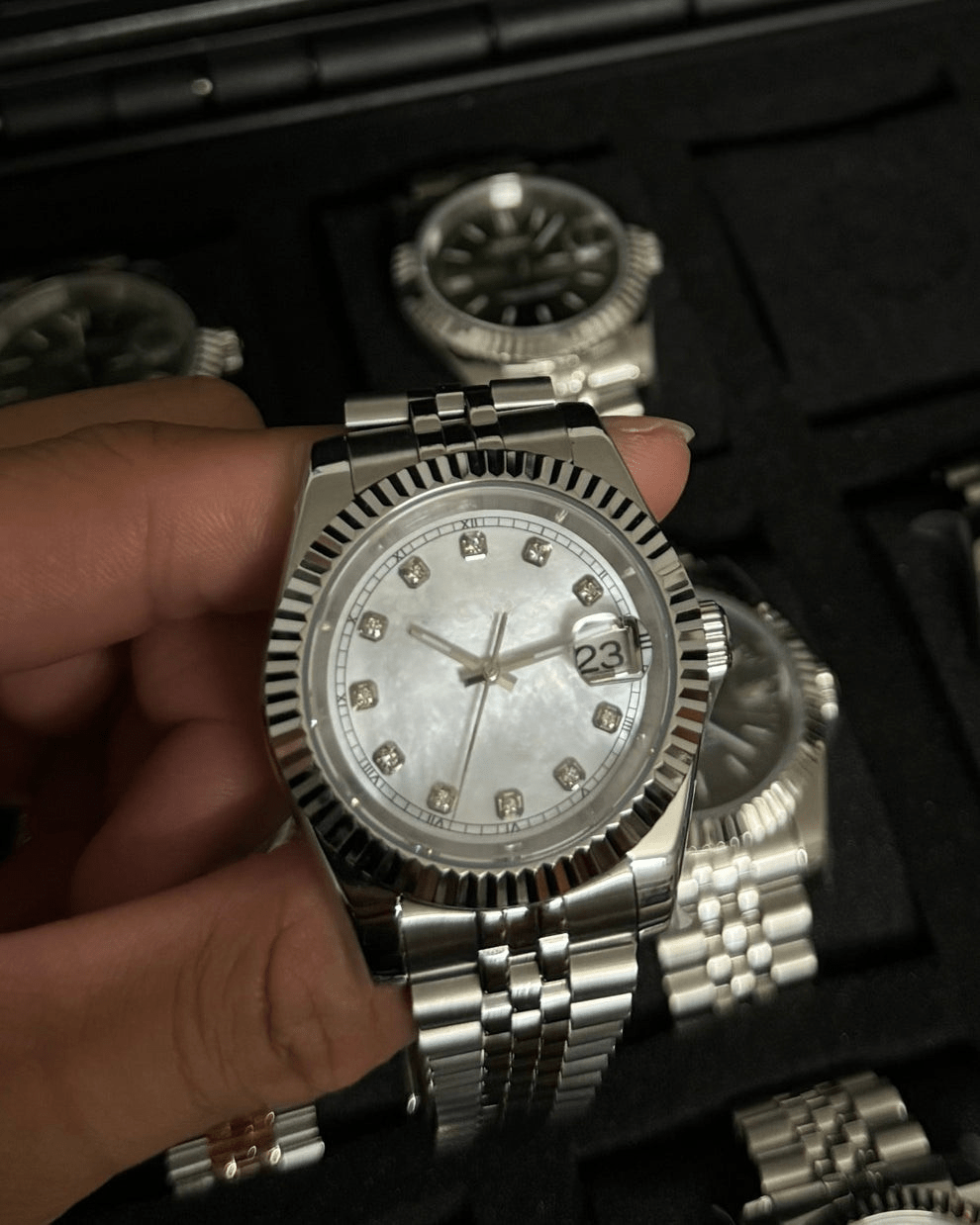 white diamond dial stainless steel Seiko NH35 mod watch on jubilee bracelet, product shot