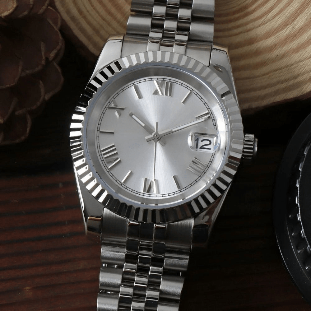 white Roman dial stainless steel Seiko NH35 mod watch standing upright on jubilee bracelet, dark background