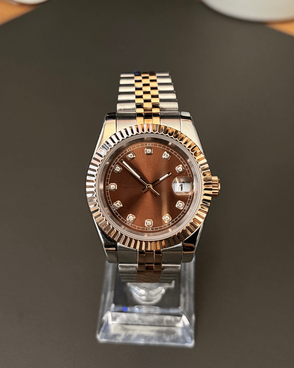 brown diamond dial two-tone rose gold and stainless steel Seiko NH35 mod watch on jubilee bracelet, front view