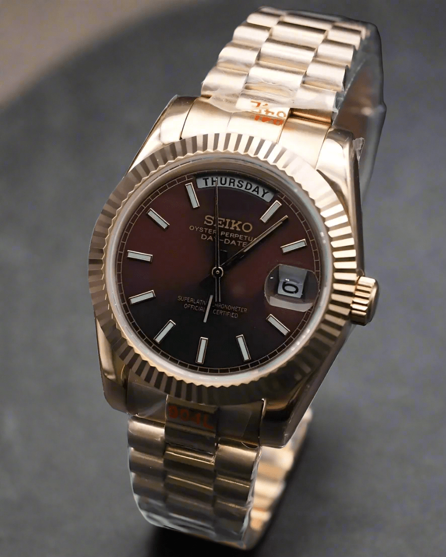 Seiko mod day date gold tone case brown ombre dial 40.5mm President bracelet angled view