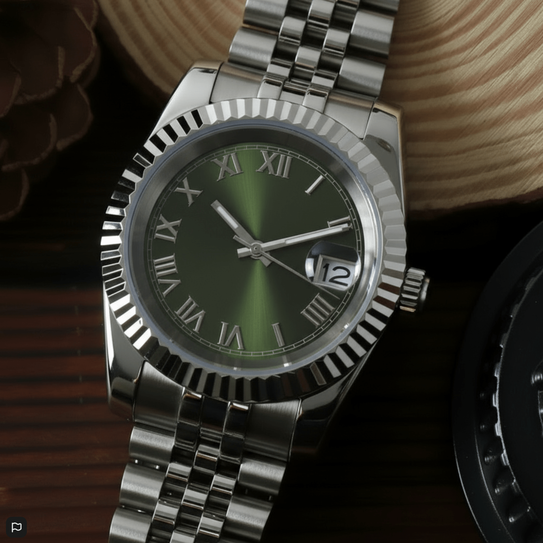 green Roman dial stainless steel Seiko NH35 mod watch on jubilee bracelet, front view on white background