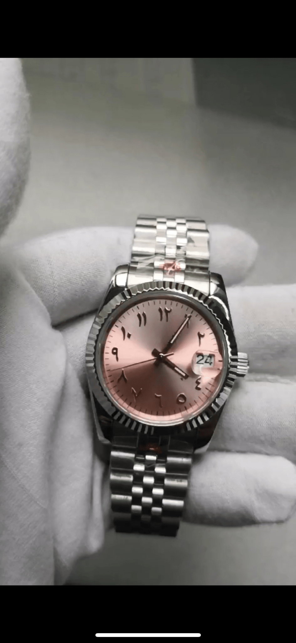 pink Arabic Seiko mod automatic watch with stainless steel bracelet, product shot