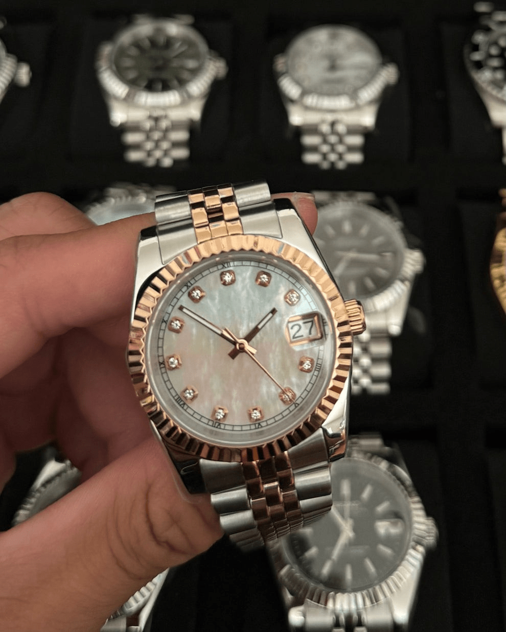 ladies white diamond dial two-tone rose gold and stainless steel Seiko NH35 mod watch on jubilee bracelet, product shot